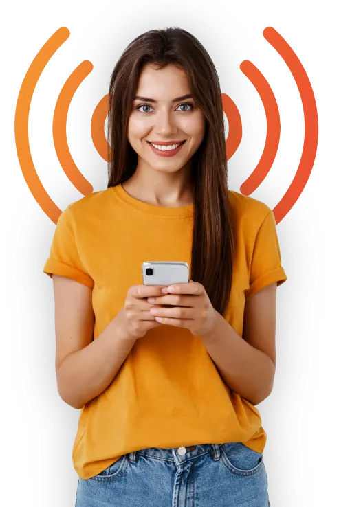 a girl wearing an orange tshirt using a mobile phone